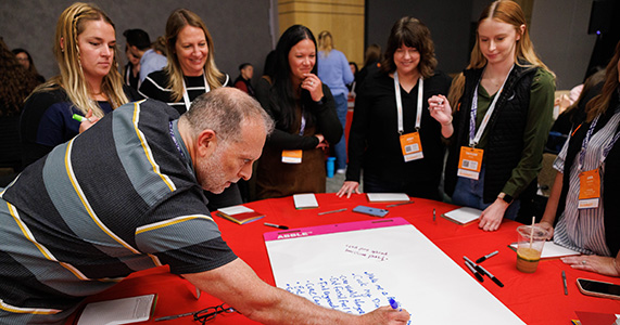 event attendees participating in sales kickoff activity
