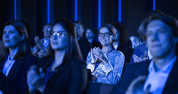 engaged audience watching corporate event keynote speaker