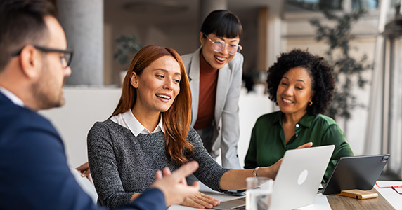 C-suite executives discussing incentive travel program 