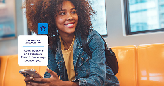 employee receiving peer-to-peer recognition on mobile device