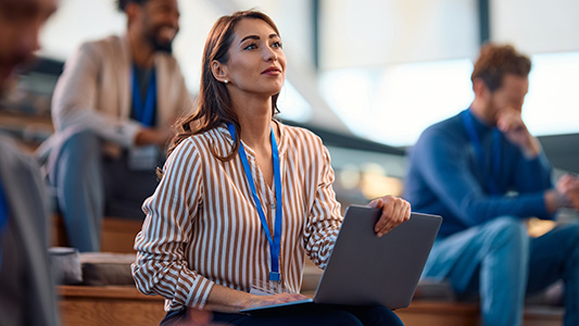 corporate event attendee participating in workshop