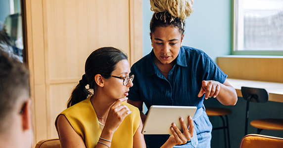 channel program managers strategizing together