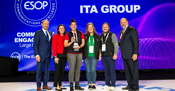 ITA Group Community of Companies team members accept AACE Award.