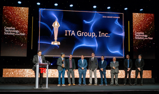 ita group team members accept Prometheus Award